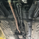 Image for article titled I Replaced the Struts on My Nissan Pao and Got Spoiled By a Lift and Air Tools